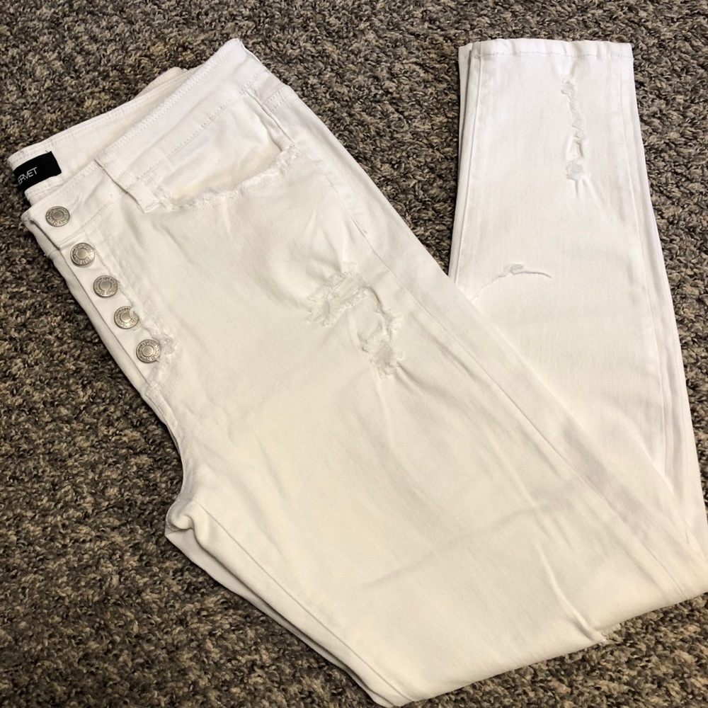 Distressed white denim skinny jeans